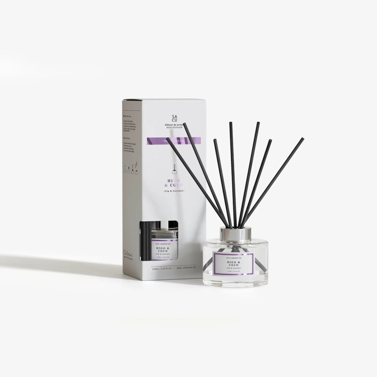 Frasco Mikado Premium con varitas aromáticas sobre mesa - Sweet Home
